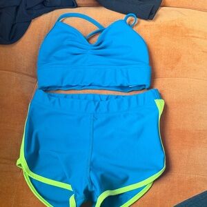 Tiger Friday set top is CL And bottom is CXL Blue Two-Piece Set with Lime Trim